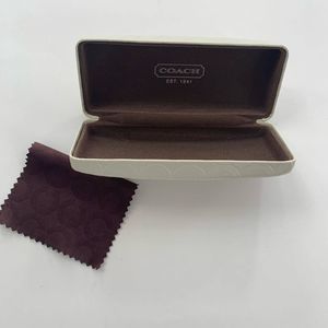 Coach monogrammed cream glasses case